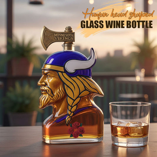 Glass Bottle With Wine In The Shape Of A Human Head